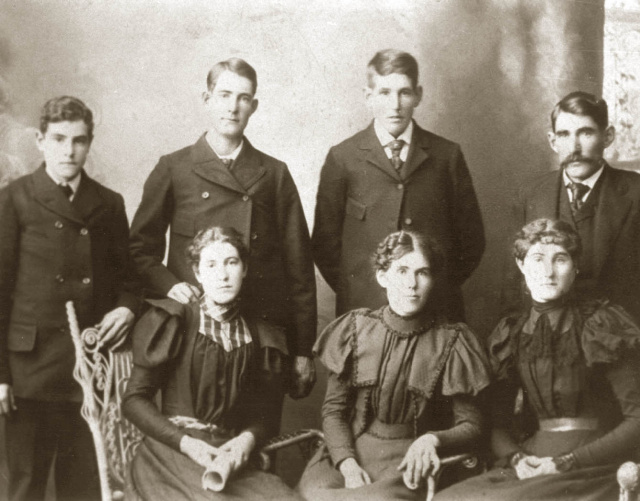 photo: children of John Thomas Ferrel Ist and Martha Susan Costley. back row: Frank, George, Charles and Will. Front row: :Dolly, Nellie and Carrie.
